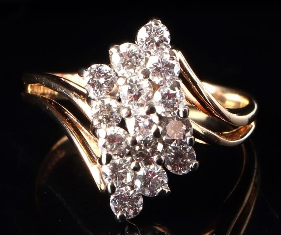 1.05CTW 14K YELLOW GOLD LADIES RING W/ 15 DIAMONDS: 14k yellow gold ladies ring with fifteen 0.07ct diamonds arranged in a diamond and in an ascending height on the face (1.05ctw).Stone Type: DiamondWeight: 4.1 gramsSize: US 6.75Condition: See pictures