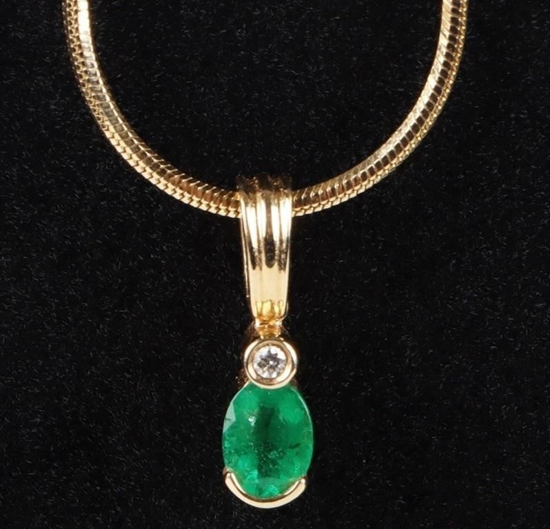 14K YELLOW GOLD EMERALD DIAMOND LADIES NECKLACE: 14K yellow gold emerald diamond ladies necklace. Gemstones to include one 0.20ct oval cut emerald, and one 0.01ct round cut diamond.Stone Type: AssortedWeight: 5.10 GramsSize: 16.00"Condition: Little