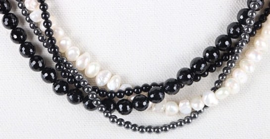 14K GOLD-CLASPED THREE-STRAND BEADED NECKLACE