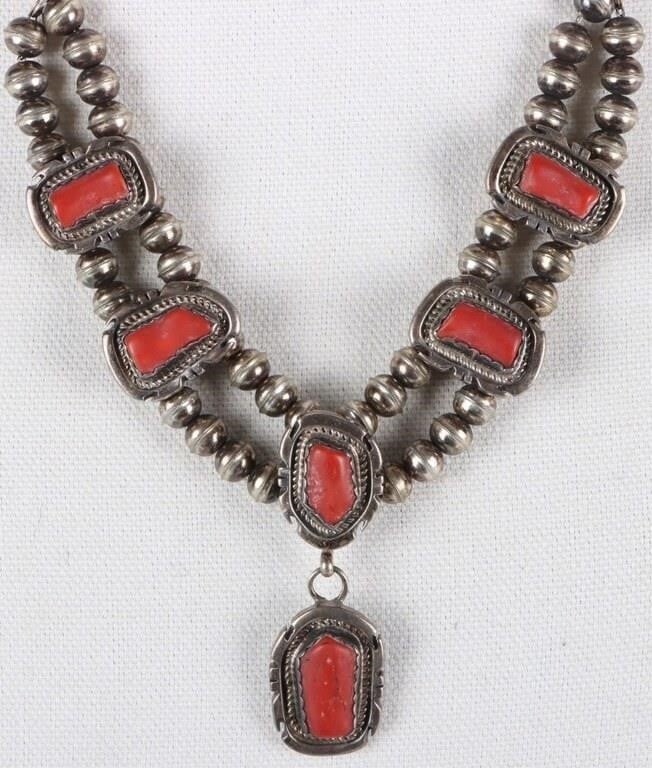 RED CORAL STERLING SILVER SOUTHWEST NECKLACE: Red coral sterling silver southwest style beaded ladies necklace. Stone Type: Coral Weight: 68.28 grams Size: 20" length Condition: Wear commensurate with age, see images.