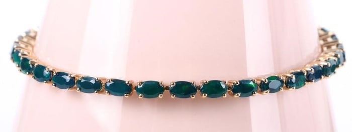 10K YELLOW GOLD LADIES BRACELET W/ GREEN STONES