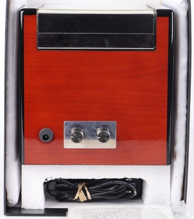WATCH WINDER LACQUERED CHERRY WOOD W/ BOX: Lacquered cherry wood watch winder of unknown brand. Includes plug, instructions, box, and original packaging materials. Watch WinderSize: 7.25 X 6 X 6 w/o boxCondition: The box suffers from minor scr