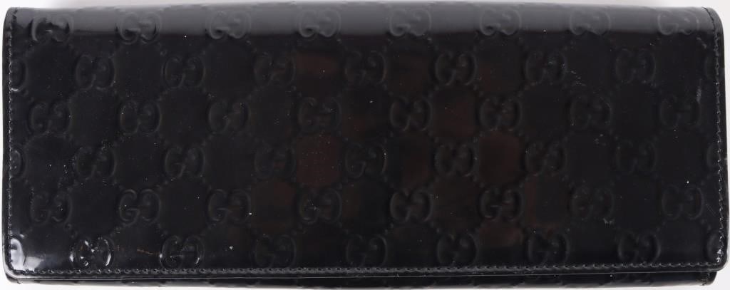 GUCCI BLACK GUCCISSIMA EMBOSSED MONO LONG WALLET: Gucci Black Guccissima embossed Monogram leather bifold long wallet.Size: 10.50" X 4.00"Condition: Lightly used, see images for details.