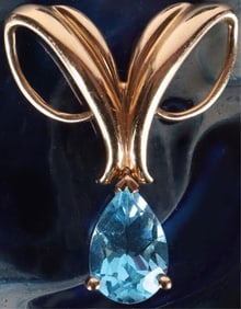10K YELLOW GOLD LADIES PENDANT W/ TOPAZ GEMSTONE
