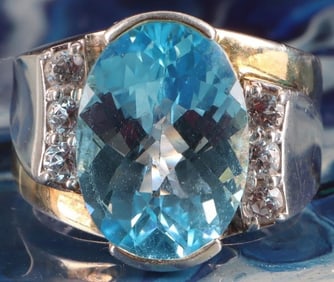 STERLING SILVER OVAL BLUE TOPAZ LADIES RING