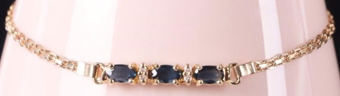 14K YELLOW GOLD LADIES BRACELET W/ DIAS & TOPAZ