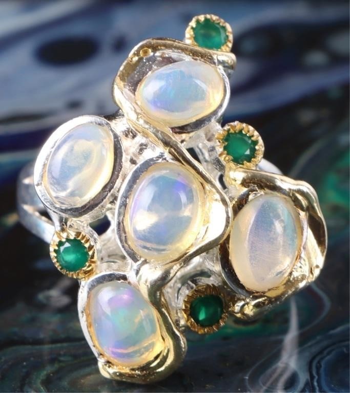 LARGE COCKTAIL CLUSTER OPAL LADIES STERLING RING: Large cocktail cluster opal ladies sterling silver ring.Stone Type: AssortedWeight: 7.90 GramsSize: US 7.5Condition: New.