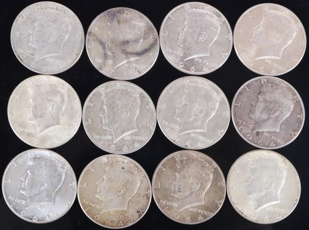 ASSORTED 90% SILVER KENNEDY HALF DOLLARS - (12): Twelve assorted 90% silver John F. Kennedy Half Dollars.Weight: 150.00 GramsCondition: Ranges from Fine to Almost Uncirculated.