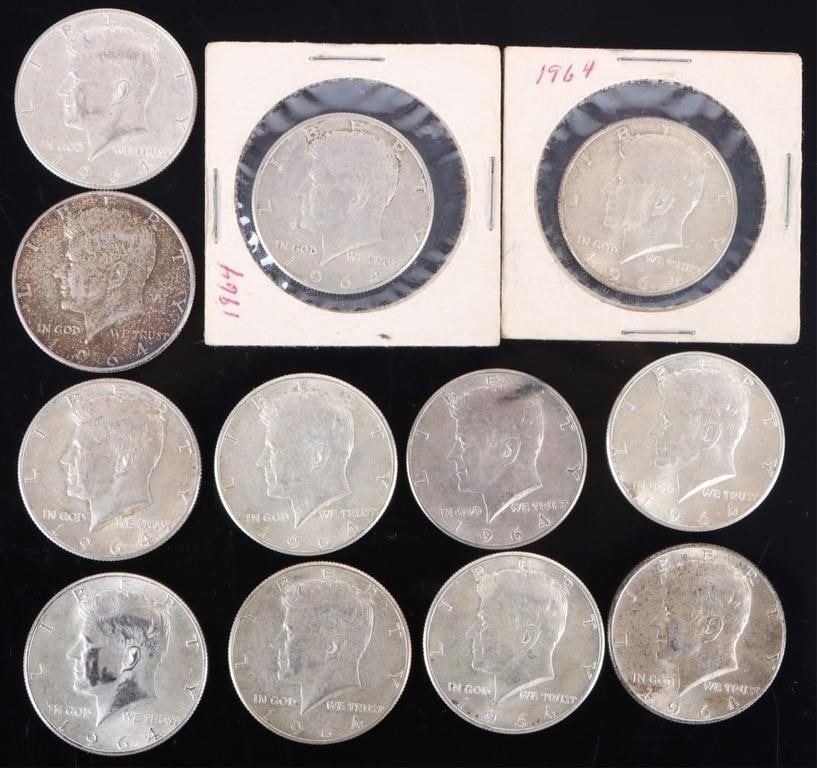 ASSORTED 90% SILVER KENNEDY HALF DOLLARS - (12): Twelve assorted 90% silver John F. Kennedy Half Dollars.Weight: 150.00 GramsCondition: Ranges from Fine to Almost Uncirculated.