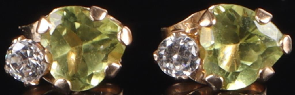 HEART PERIDOT 10K YELLOW GOLD STUD EARRINGS: Heart peridot 10K yellow gold ladies stud earrings with two 0.25CT heart peridot and cubic zirconium.Stone Type: AssortedSize: 0.5" LengthCondition: Some wear. See images for complete condition.