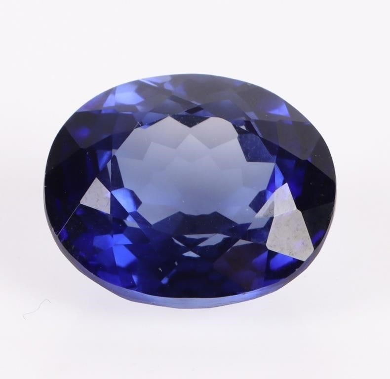 26.30CT LARGE OVAL BLUE SAPPHIRE LOOSE GEMSTONE: 26.30CT large oval-cut blue loose sapphire. Stone is electronically tested and identified, tester does not distinguish between natural and lab grown.Stone Type: SapphireSize: 26.30CTCondition: Very fi