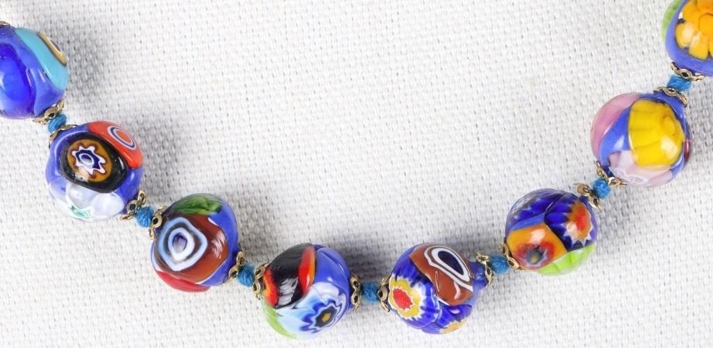 ITALIAN MURANO MILLEFORI BEADED GLASS NECKLACE: Italian Murano millefori glass ladies necklace with colorful details and a textured design.Weight: 103.23 GramsSize: 24" lengthCondition: See images, like-new qualities.