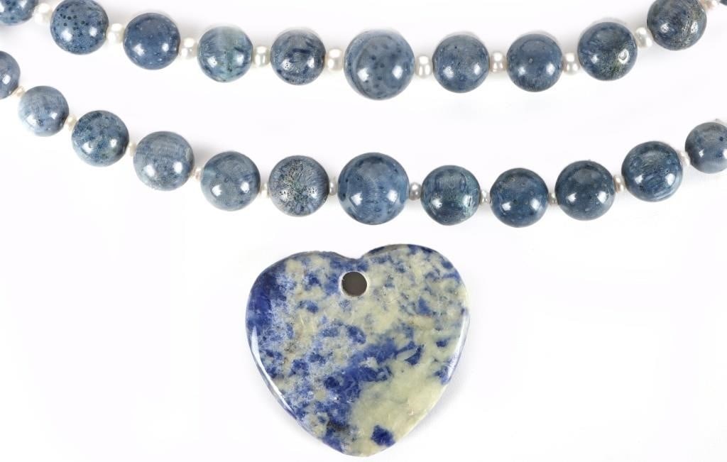 SODALITE & DUMORTIERITE STONE BEADED JEWELRY: Blue stone beaded jewelry to include two dumortierite and seed pearl beaded necklaces and one sodalite heard pendant. Necklaces both have sterling silver clasps.Stone Type: AssortedWeight: 113.7
