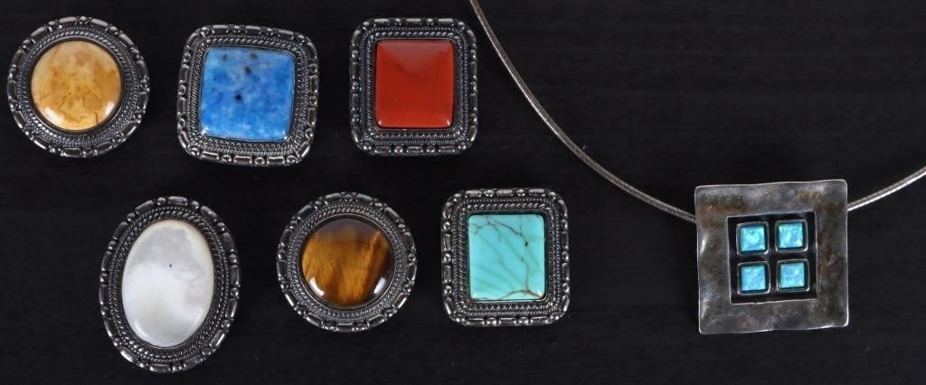 SW STYLE STERLING SILVER JEWELRY BRACKETS (7): Southwest style sterling silver jewelry brackets, each of which can be attached to a belt or necklace. To include one howlite piece, one blue jasper piece, one red jasper piece, one yellow jasper