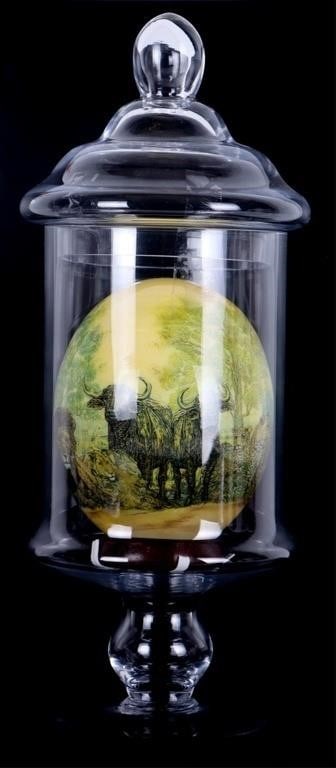 HAND PAINTED WILDLIFE SCENE DECOUPAGE EGG: Hand painted wildlife scene decoupage ostrich egg. This egg is beautifully painted with elephants, lions, cheetahs, rhinos and ox. It comes in a glass stand to protect the egg.Size: 16.25" x 6.5"
