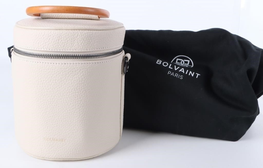 BOLVAINT GENUINE LEATHER BUCKET PURSE HANDBAG: Genuine cream-colored leather bucket handbag by Bolvaint, includes wooden handle. Includes branded cinched handbag and all original packaging material.Size: 8.25 X 6.25"Condition: Like new, see