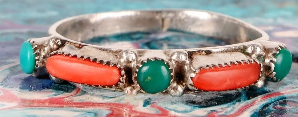 STERLING SILVER TURQUOISE & CORAL LADIES RING: Sterling silver turquoise and coral ladies narrow ring.Stone Type: AssortedWeight: 2.24 GramsSize: US 7.5Condition: Gently used. See images for complete condition.