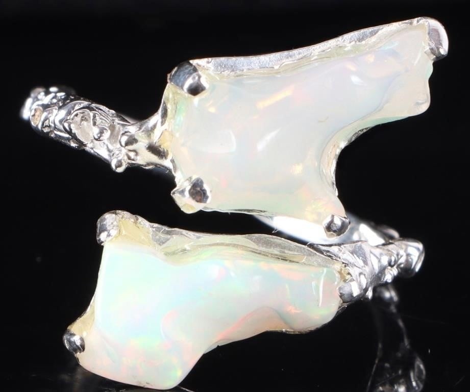 STERLING SILVER MENS BRUTALIST RING W/ OPALS: Sterling silver ladies Brutalist-style ring. The band is twisted in a partial spiral with two medium-sized natural opals set on either end.Stone Type: OpalWeight: 4.6 gramsSize: US 10Condition: Like n