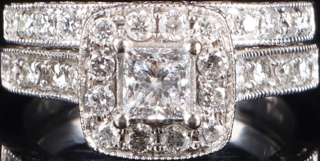 14K WHITE GOLD NATURAL DIAMOND WEDDING RING SET: 14K white gold natural diamond wedding ring set to include a band ring with thirteen 0.02ct round cut natural diamonds, and a wedding ring with one 0.45ct princess cut natural diamond and twenty 0.02c