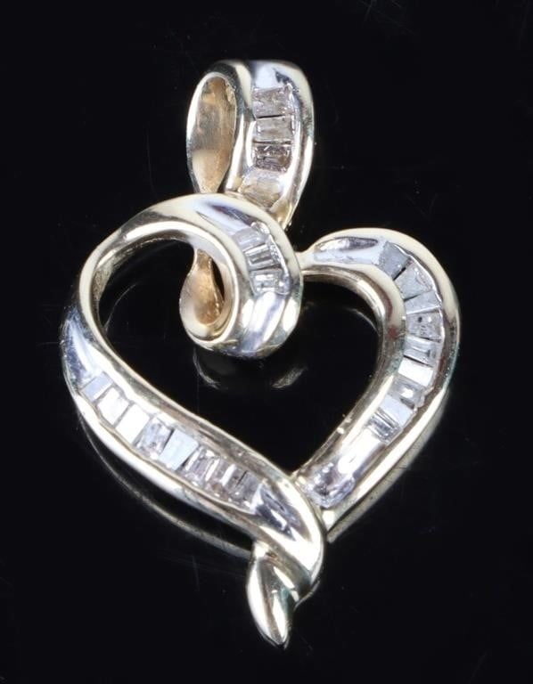 0.21CTW DIAMOND 10K YELLOW GOLD HEART NECKLACE: 0.21CTW diamond 10k yellow gold heart necklace.Stone Type: DiamondWeight: 1.69 GramsSize: 1.0" lengthCondition: Very fine.