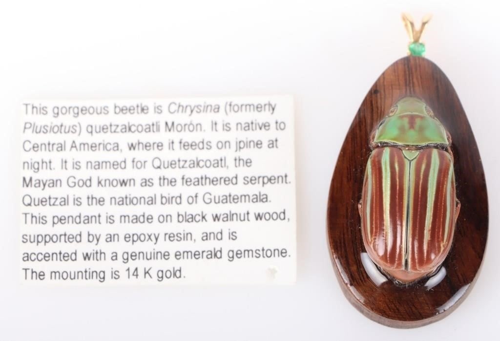 14K GOLD EMERALD CHRYSINA BEETLE PENDANT: 14K yellow gold and emerald walnut wood Chrysina Quetzalcoati beetle pendant,Stone Type: EmeraldSize: ~2" lengthCondition: New
