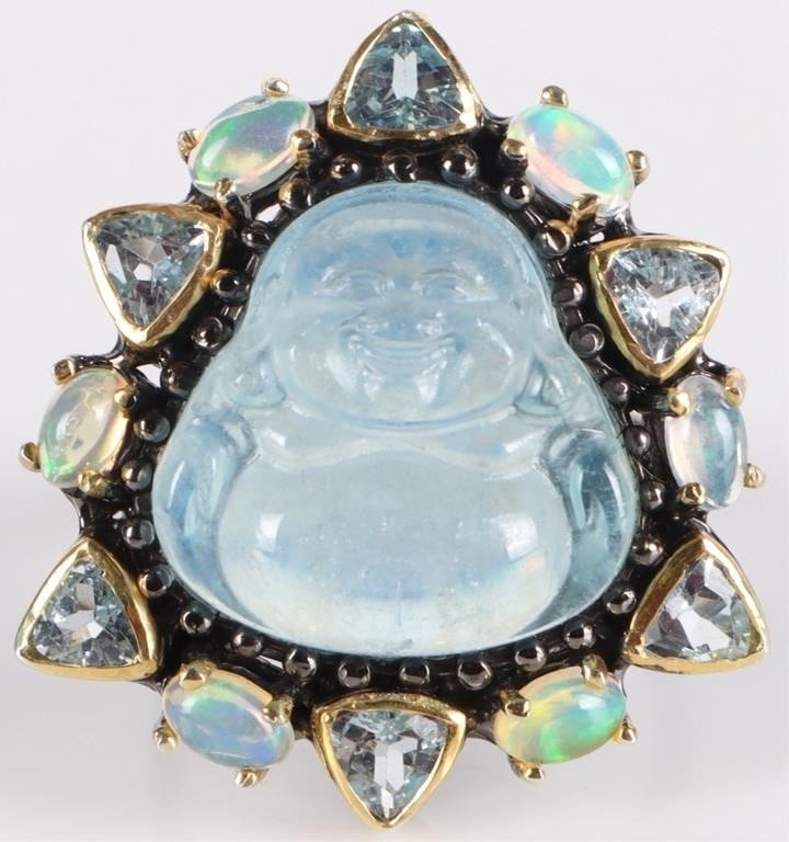 BUDDHA AQUA TOPAZ OPAL STERLING SILVER RING: Buddha carved aquamarine, topaz and opal sterling silver ladies ring.Stone Type: AssortedWeight: 12.40 gramsSize: US 8Condition: New.