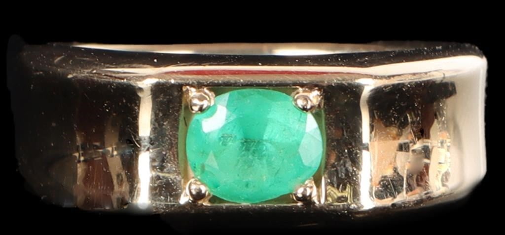 14K YELLOW GOLD OVAL FACETED EMERALD MEN'S RING: 14K yellow gold oval faceted emerald men's ring. Gemstones to include one 0.75ct oval faceted emerald measuring 6.40mm X 5.43mm X 3.75mm.Stone Type: EmeraldWeight: 12.74 GramsSize: 8.50 U.S.Condition: