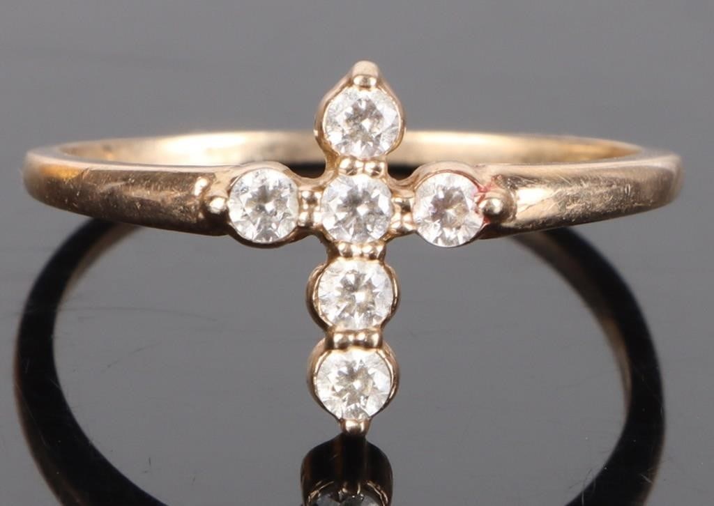 10K YELLOW GOLD CUBIC ZIRCONIUM CROSS LADIES RING: 10K yellow gold Cubic Zirconium cross ladies ring.Stone Type: CZSize: 8.25 U.S.Condition: Very fine.