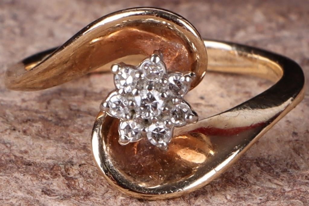 10K YELLOW GOLD DIAMOND CLUSTER LADIES RING: 10K yellow gold diamond cluster ladies ring. Gemstones to include eight 0.01ct round cut diamonds.Stone Type: DiamondWeight: 2.87 GramsSize: 4.75 U.S.Condition: Little to no wear, see images for detai