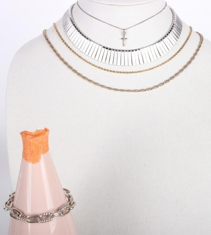 ASSORTED GOLD & SILVER-TONE LADIES FASHION JEWELRY: Assorted gold & silver-tone ladies fashion jewelry lot of 5. This lot includes one silver-tone link bracelet, a Monet signed choker necklace and three other fashion necklaces.Weight: 93.08 Grams total