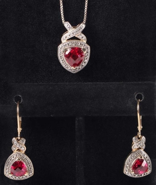 STERLING SILVER RUBY LADIES EARRING & NECKLACE SET: Sterling silver ruby ladies earring & necklace set to include: one pair of trillion rose ruby lever back earrings with one 1.00ct trillion rose cut ruby per earring, and one trillion rose ruby matchin