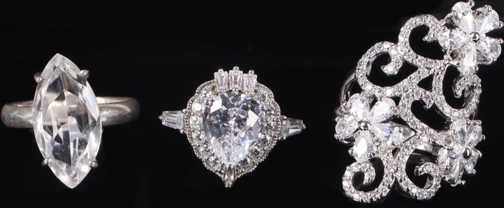STERLING SILVER CZ/ QUARTZ LADIES RINGS - (3): Sterling silver cubic zirconia & quartz ladies rings to include: one sterling silver ring with one 4.0CT marquise cut quartz, and two beautiful sterling silver CZ rings.Stone Type: AssortedWeight: