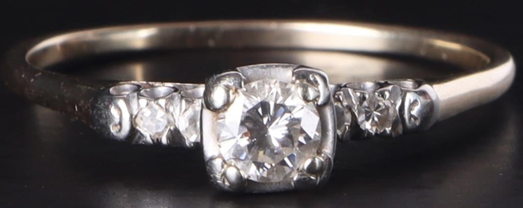 14K YELLOW GOLD LADIES RING W/ FIVE DIAMONDS: 14k yellow gold ladies ring with a 0.2ct round-cut center diamond and four 0.02ct round-cut diamonds flanking it, two on either side.Stone Type: DiamondWeight: 1.74 gramsSize: US 8.75Condition: See pi