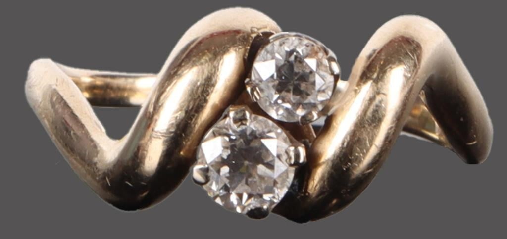 ~0.50CT DIAMOND 2 STONE BYPASS RING IN 14K: 0.50CT diamond two stone bypass ladies ring set in 14K yellow gold.Stone Type: DiamondWeight: 4.03 GramsSize: US 8.0Condition: Slight surface scratches from normal wear. See images for complete condit