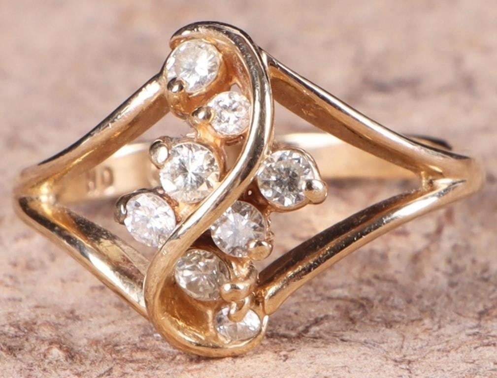 14K YELLOW GOLD NATURAL DIAMOND LADIES RING: 14K yellow gold natural diamond ladies ring. Gemstones to include eight 0.02-0.03ct round cut natural diamonds. Diamonds tested natural via Gemlogis short wave UV fluorescence.Stone Type: DiamondWeigh