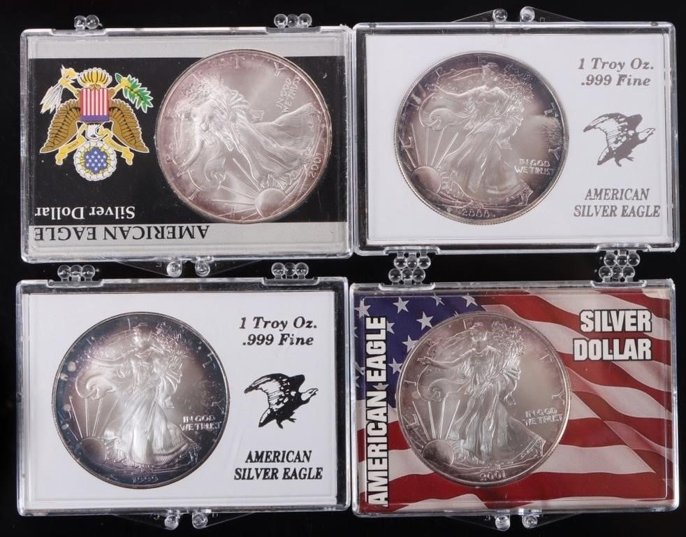 ASSORTED FINE SILVER AMERICAN EAGLES RT - (4): Assorted fine silver American Eagles rainbow toned.Weight: 124.416 GramsCondition: Mint State uncirculated with rainbow tone.