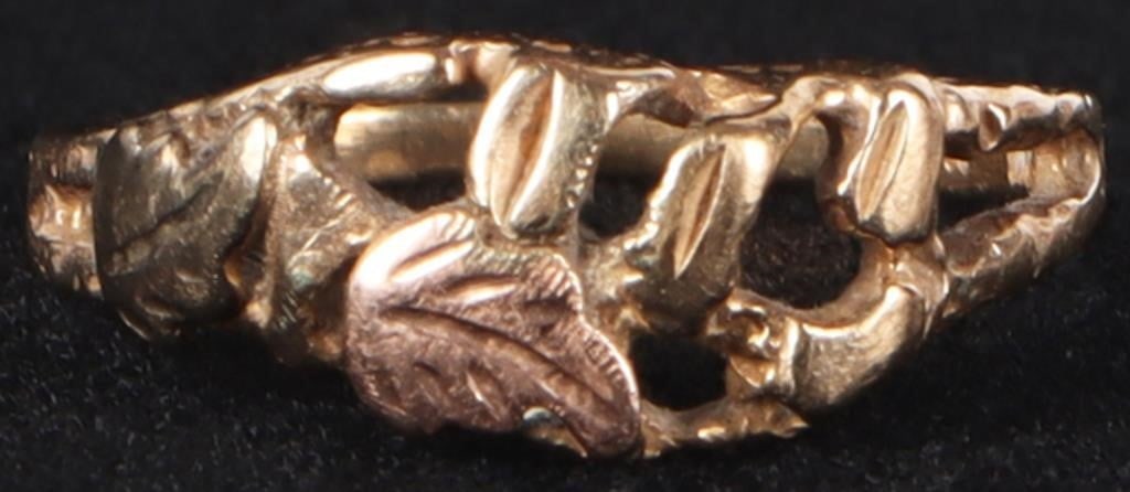 10K YELLOW GOLD LADIES RING W/ ROSE GOLD LEAVES: 10k yellow gold ladies ring with leaves sculpted on its face, including one rose-gold leaf.Weight: 1.62 gramsSize: US 4.75Condition: See pictures