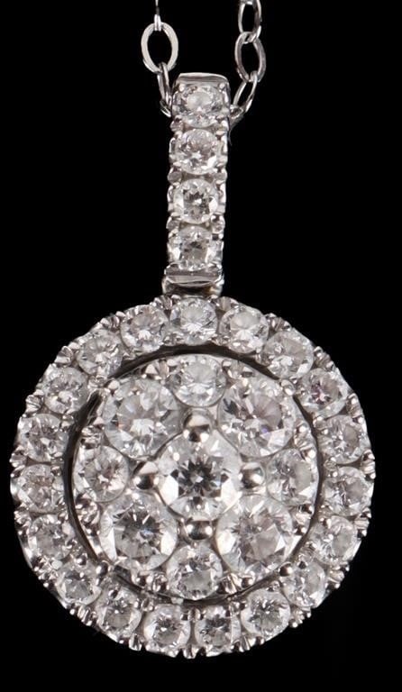 14K WHITE GOLD DIAMOND ITALIAN LADIES NECKLACE: 14K white gold diamond Italian ladies necklace w/ beautiful flower designed filigree. Gemstones to include five 0.05ct round cut diamonds, four 0.02ct round cut diamonds, and twenty-three 0.01ct