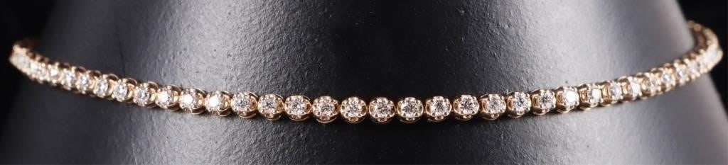 10K YELLOW GOLD DIAMOND LADIES TENNIS BRACELET: 10K yellow gold diamond ladies tennis bracelet. There are 78 0.01CT diamonds for a total carat weight of 0.78CT.Stone Type: DiamondWeight: 2.77 GramsSize: 7.25"Condition: No missing, lose or damaged