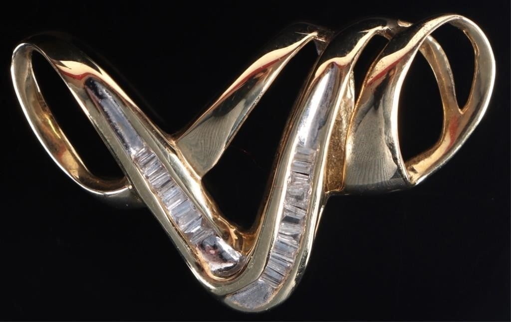 14K YELLOW GOLD ABSTRACT LADIES PENDANT W/ DIAS: 14k yellow gold ladies pendant sculpted in a twisting abstract style and with seventeen melee diamonds toward its center. The beveled area above the diamonds is white gold.Stone Type: DiamondWeight: 4
