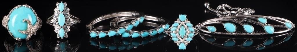 STERLING SILVER TURQUOISE JEWELRY SET W/ DIAS (5): Set of five pieces of turquoise jewelry, to include a ring with multiple medium-sized turquoise stones and six melee diamonds, a ring with a large turquoise stone and a starfish set on said stone alon