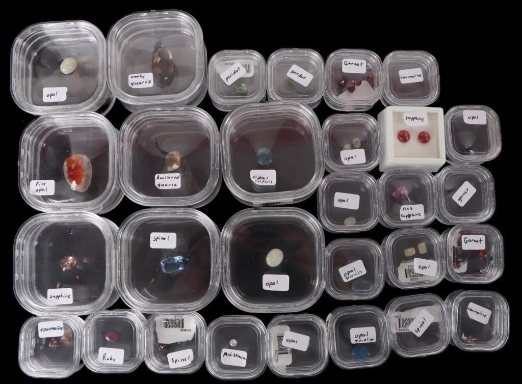 ASSORTED SEMI-PRECIOUS LOOSE GEMSTONES LOT OF 29: Assorted semi-precious loose gemstones lot of 29 to include highlights of black opal, ruby, padparascha sapphire, fire opal, garnet, pink sapphire and more. All stones tested based on their thermal