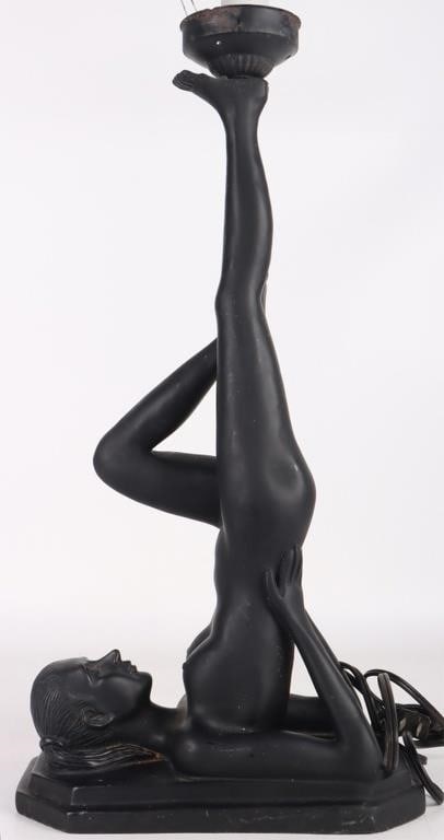 VINTAGE ART DECO NUDE LADY STATUE TABLE LAMP: Vintage art deco nude lady statue sculptural accent table lamp. Made of heavy resin with black matte finish.Size: 27.75" x 13"Condition: Wear commensurate with age. Needs a new globe.