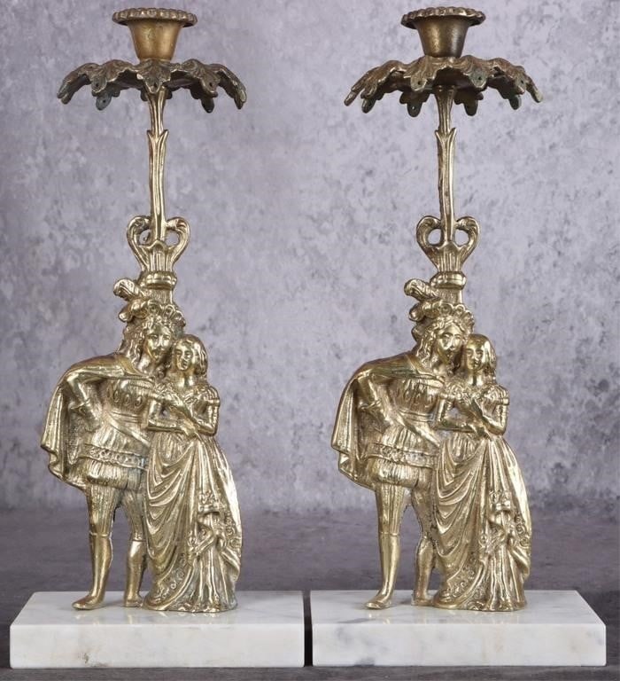 ANTIQUE VICTORIAN BRASS CANDLE HOLDER SET: Antique Victorian brass & marble candle holders set. Each has a marble base with a very detailed figural stem. The figural stems show a very detailed courting couple with a gold gilt finish. Couple lo