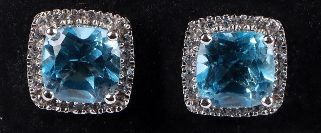 STERLING SILVER BLUE & WHITE TOPAZ LADIES EARRINGS: Sterling silver blue & white topaz ladies earrings. Gemstones to include one 1.50ct cushion cut blue topaz, and twenty-four 0.005ct round cut topaz per each earring.Stone Type: TopazWeight: 2.93 Grams