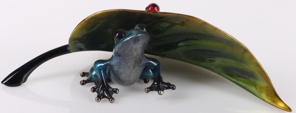 UNDERCOVER TOM COTTERILL FROGMAN BRONZE SCULPTURE: "Undercover", a Bronze Sculpture by Tom Cotterill. The piece depicts a blue frog peering out from under a large leaf. A ladybug clings to the edge just above the frog. The piece is signed "Frogman" be