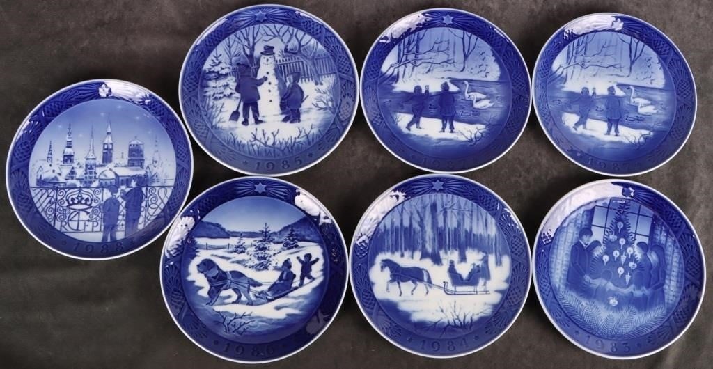 ROYAL COPENHAGEN HOLIDAY COLLECTION PLATES - (7): Royal Copenhagen Holiday collection plates to include one "Juleferie Christmas Holidays" plate, one "JIngle Bells" plate, one "Merry Christmas" plate, one "The Snowman" plate, two "Winterbirds" plate,