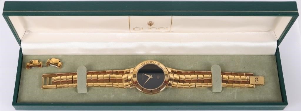 18K GOLD PLATED VINTAGE GUCCI 3300 LADIES WRSTWTCH: Vintage 18k yellow gold-plated Gucci 330 ladies quartz wristwatch. Includes original case and extra strap links.18k Gold Plated Gucci LadiesSize: 33mmCondition: See pictures.