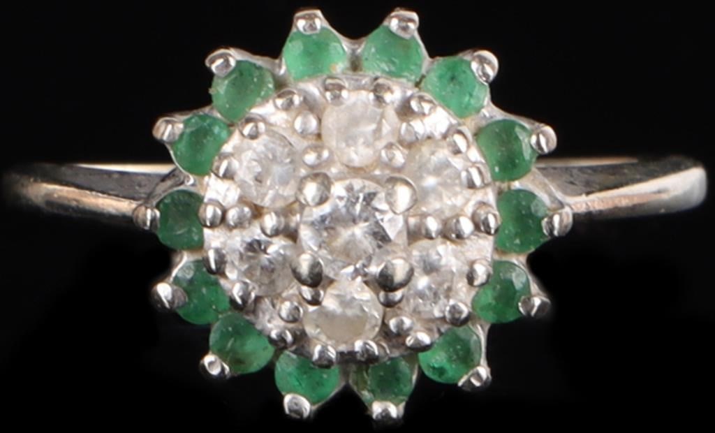 14K WHITE GOLD NATURAL DIAMOND EMERALD LADIES RING: 14K white gold natural diamond emerald ladies ring. Gemstones to include one 0.07ct round cut natural diamond, six 0.03ct round cut natural diamonds, and fourteen 0.02ct round cut emeralds.Stone Type: