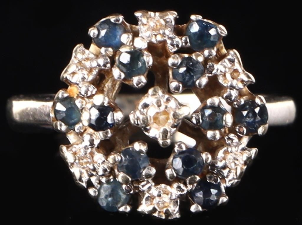 14K WHITE GOLD BLUE SPINEL SAPPHIRE LADIES RING: 14K white gold blue spinel sapphire ladies ring. Gemstones to include one 0.02ct round cut white sapphire, six 0.01ct round cut white sapphire, and twelve 0.02ct round cut blue spinel.Stone Type: Asso